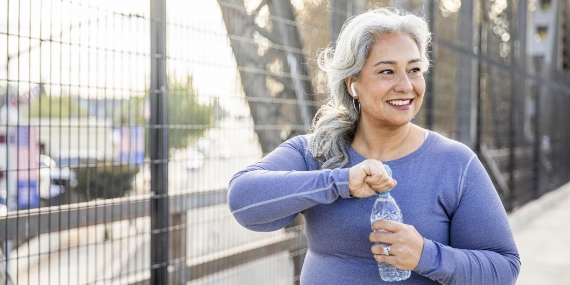 Senior woman drinking water